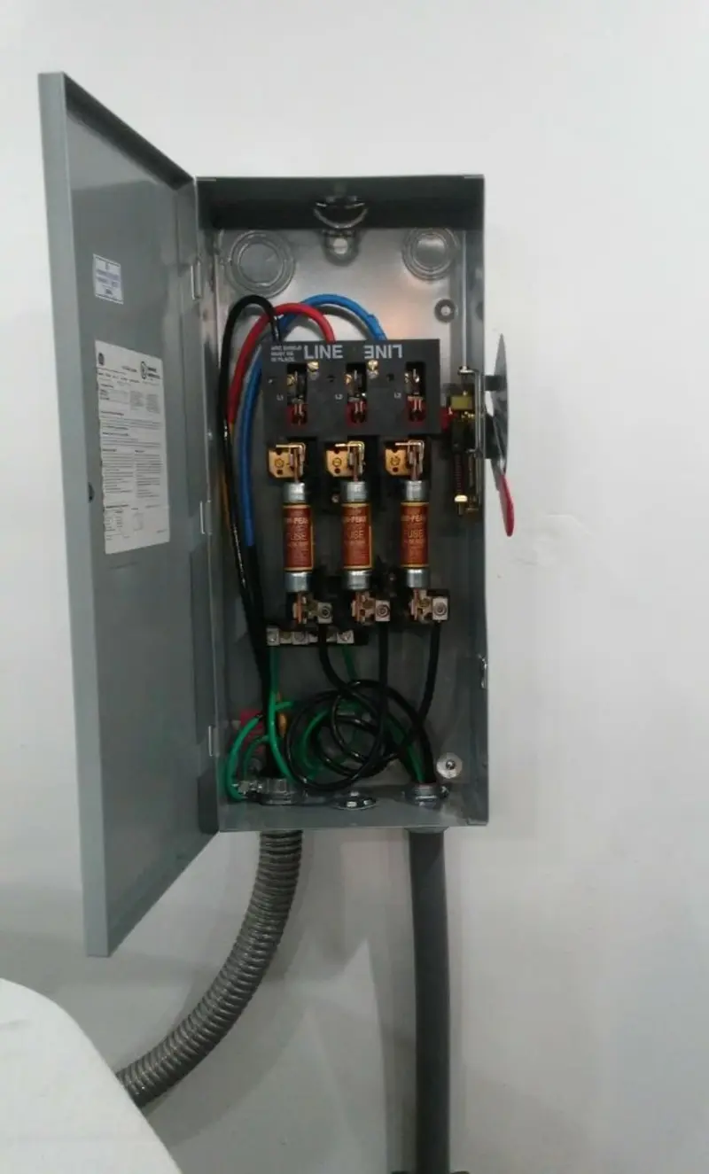 Three-phase disconnect switch installed for Smoke Detector Installation in Del Monte Forest